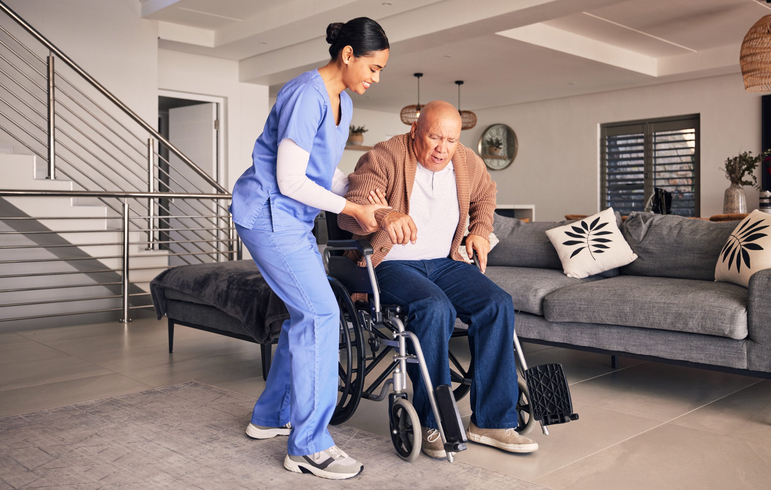 Nurse helping man in wheelchair, home and trust for medical service, physical therapy and support i.